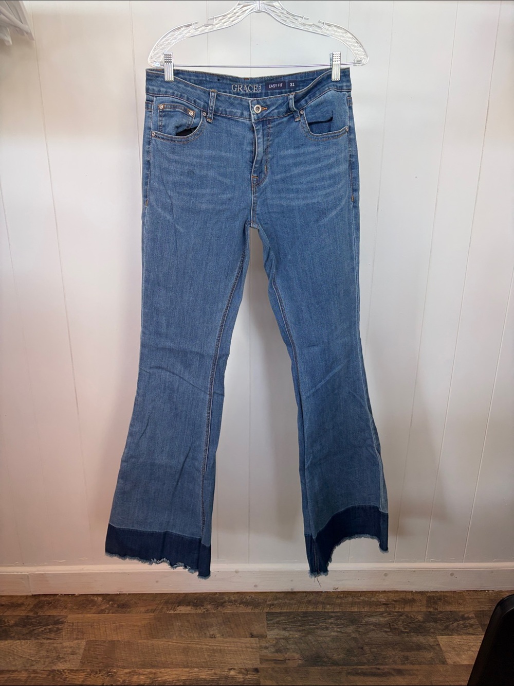 Grace in LA Light Blue High-Rise Flare Jeans with Raw Hem